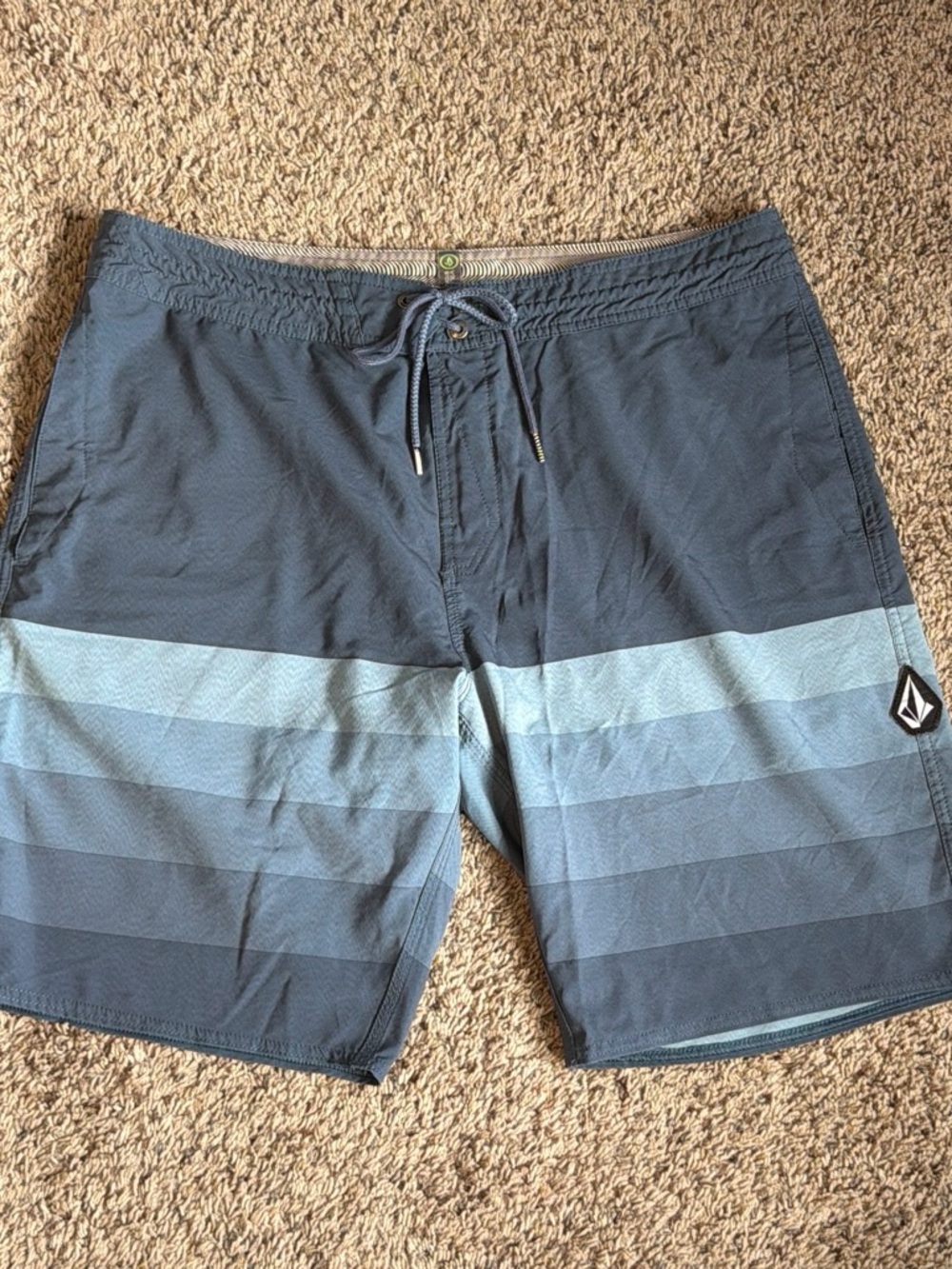 Volcom blue and gray horizontal striped board shorts size 36